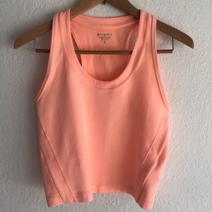 Athleta neon peach crapped wicking cropped top